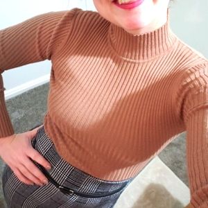 Tan turtle neck.